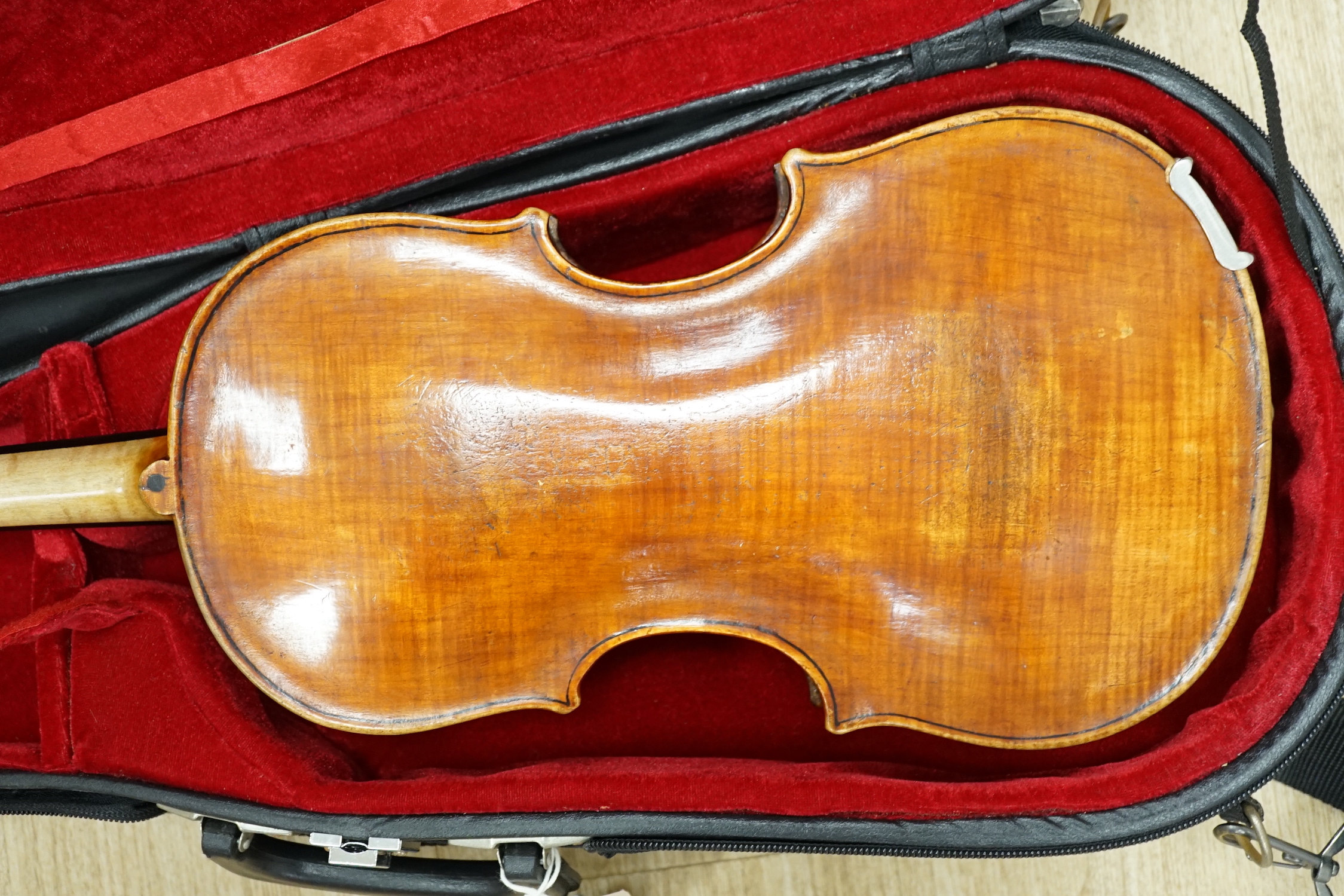 An unusual late 17th century and later cased Quinton (five string violin/viola), with early body with 18th/19th century neck and scroll, tuned for C, G, D, A, E, length of body 36.5cm, without bow